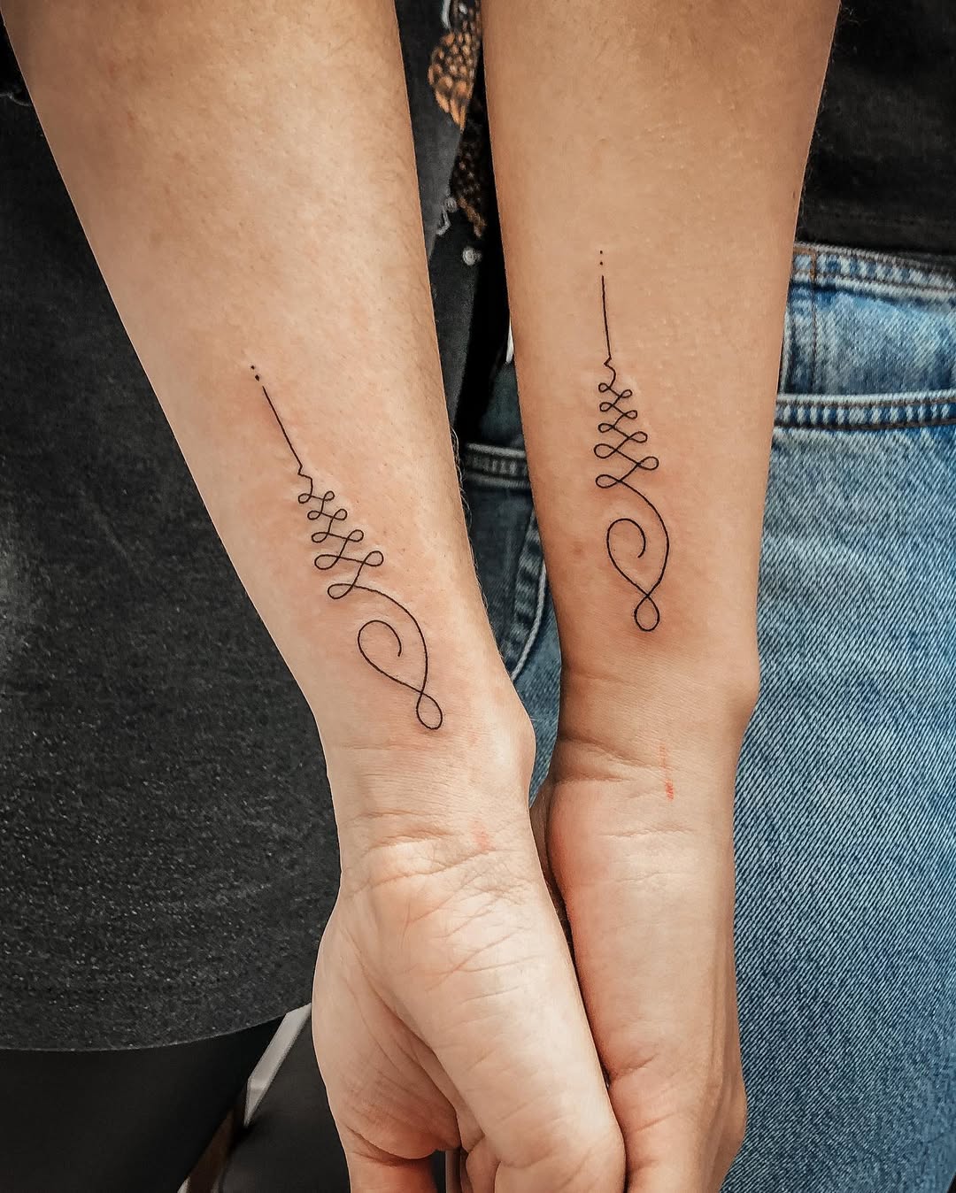 Elegant minimalistic line tattoos for sisters