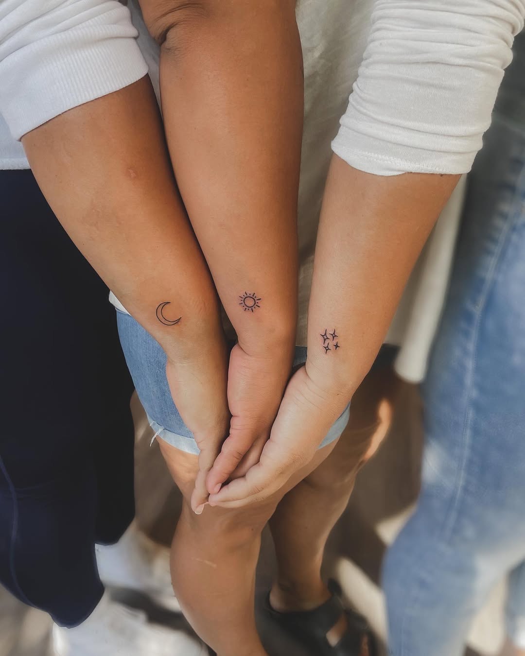 Beautiful coordinating sibling tattoos for connection