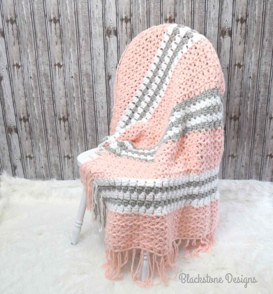 striped-crochet-blanket-pink-gray-fringe