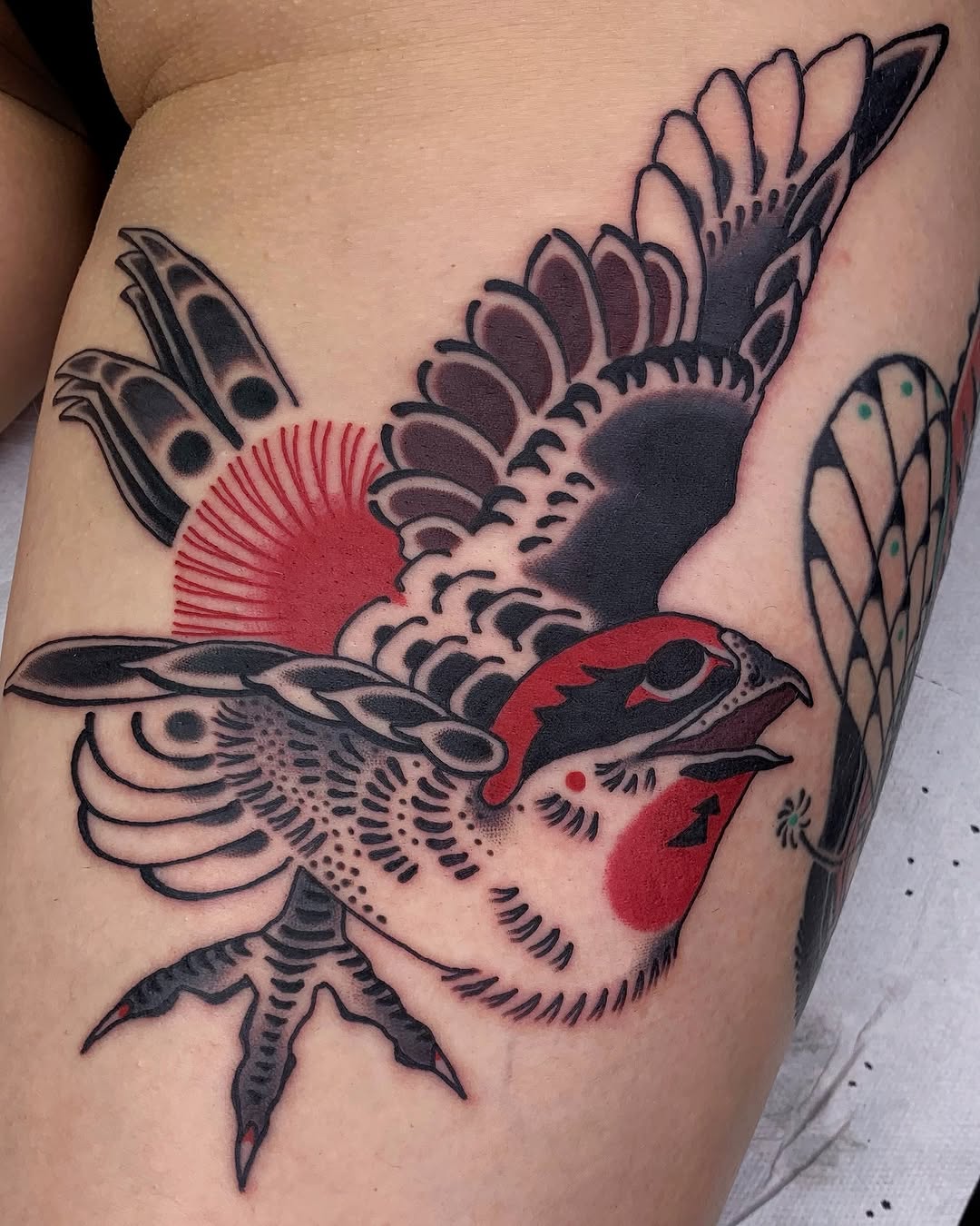 Dynamic depiction of a flying bird tattoo