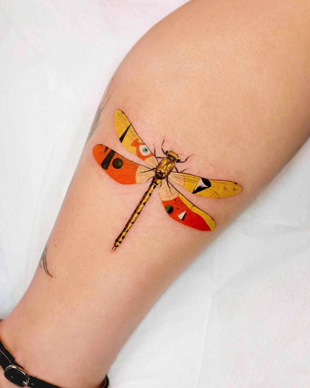 Colorful Dragonfly Tattoo on Skin