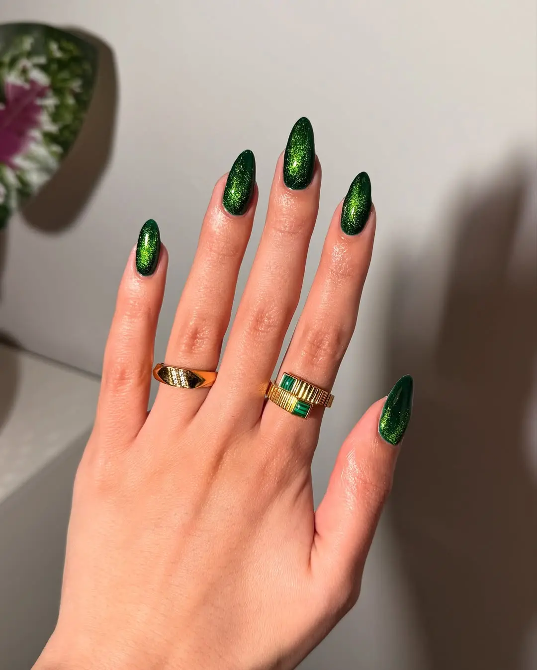 Stunning green nail art with elegant rings