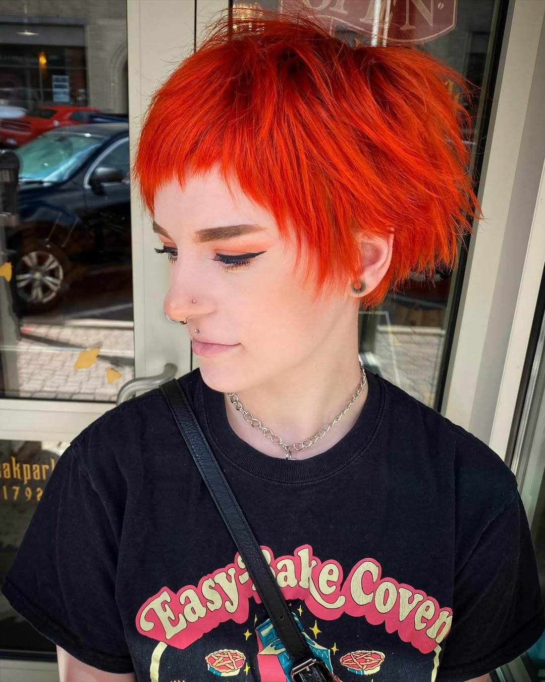 Bold orange pixie bob for a fresh look