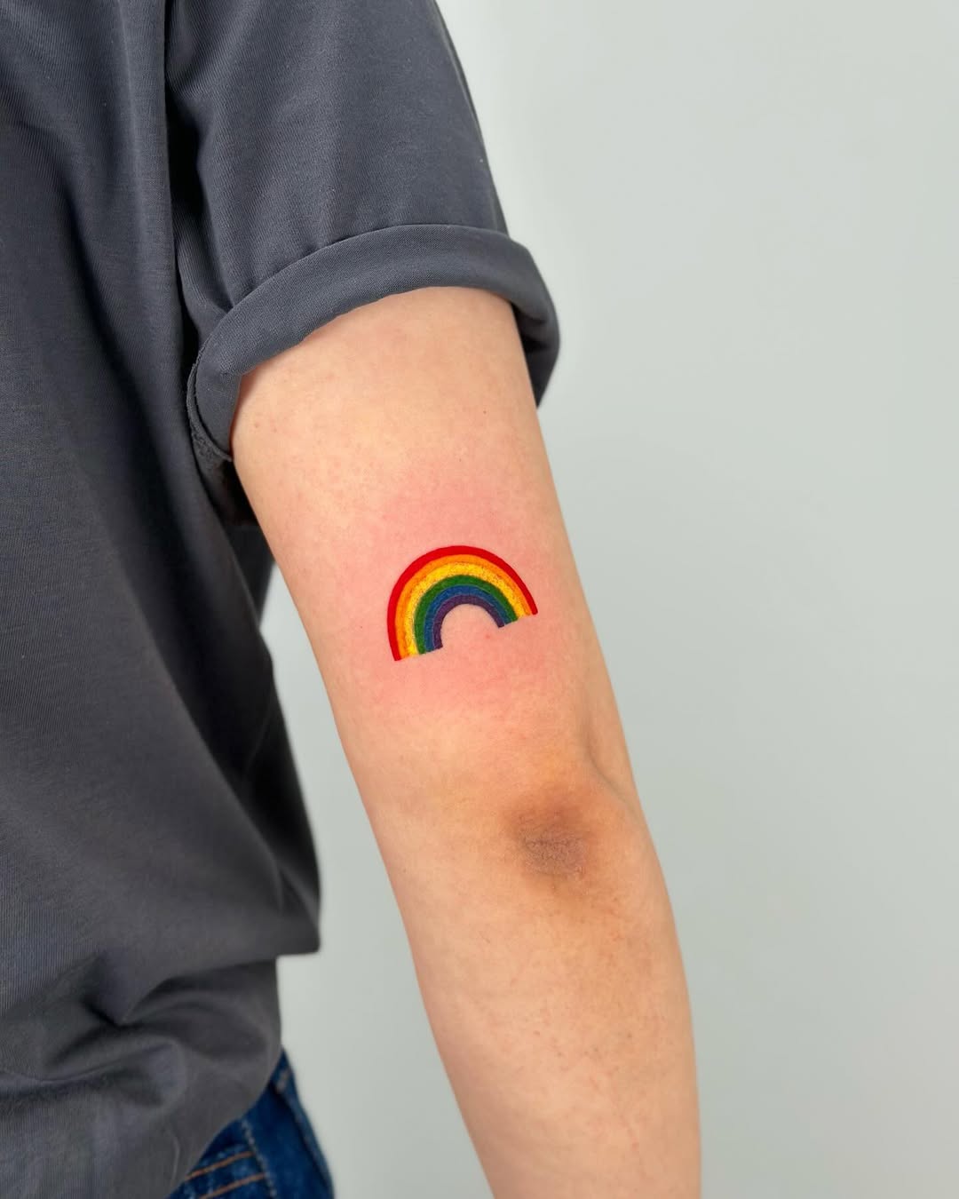 Bright and Cheerful Rainbow Tattoo Design