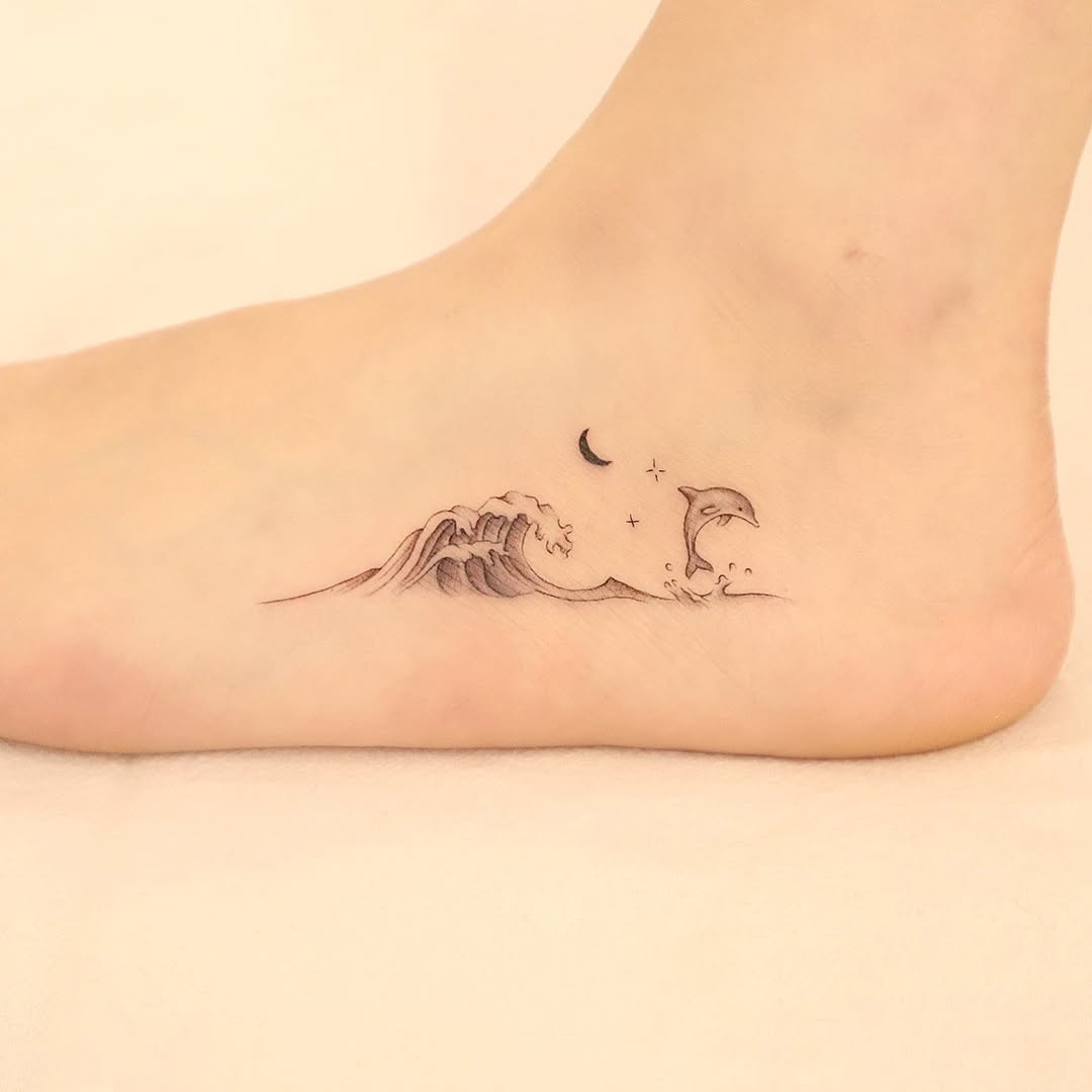 Dolphin Wave Tattoo