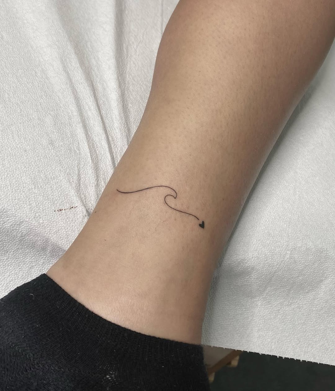 Minimalist Wave Tattoo