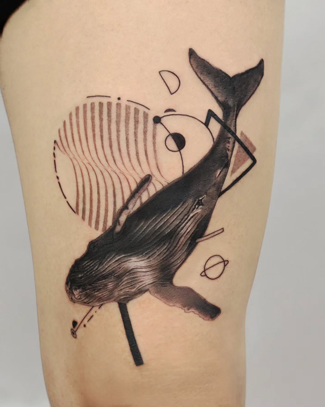 Stunning Minimalist Whale Tattoo with Abstract Elements