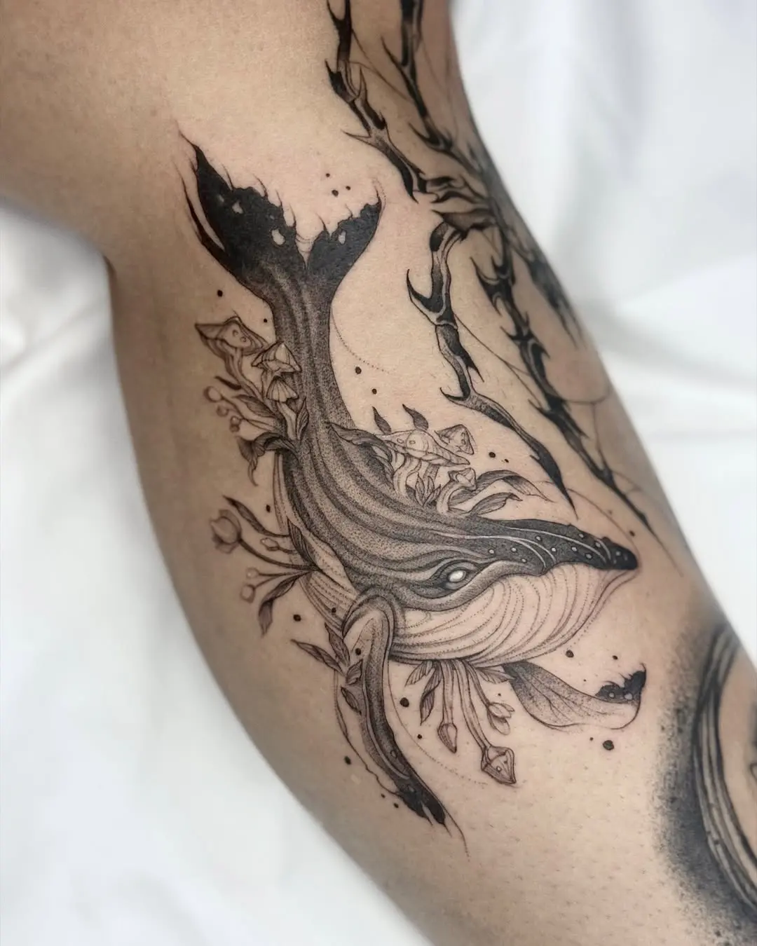 Elegant whale tattoo with intricate details