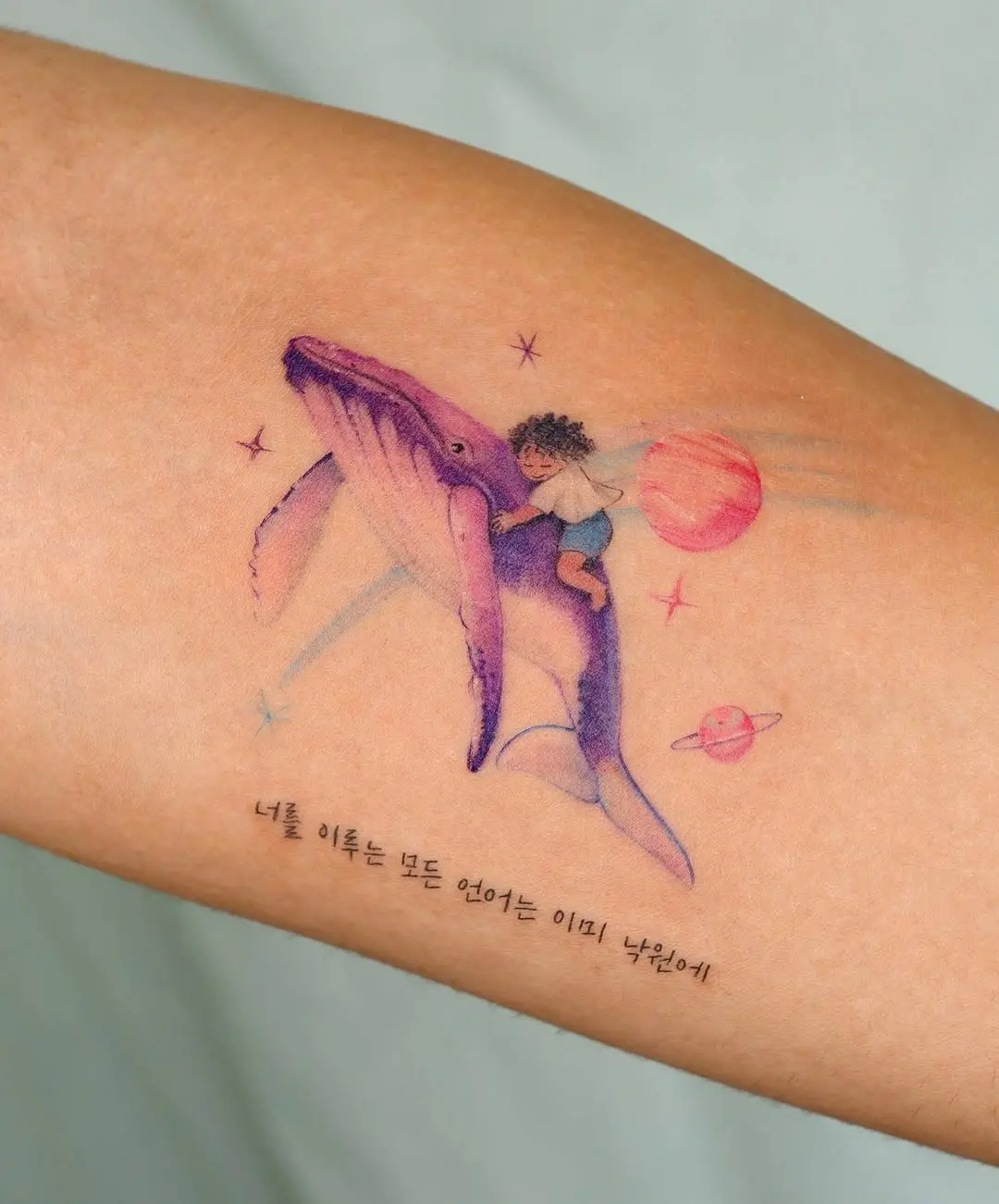 Whimsical Whale Tattoo with Child and Planets