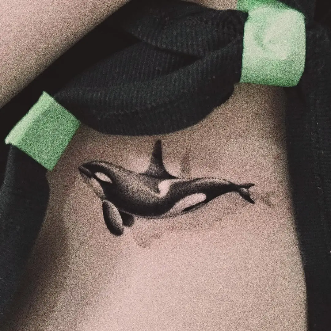 Delicate Orca Design with Fine Lines