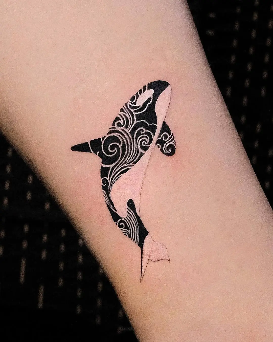 Elegant Orca Tattoo with Wave Patterns