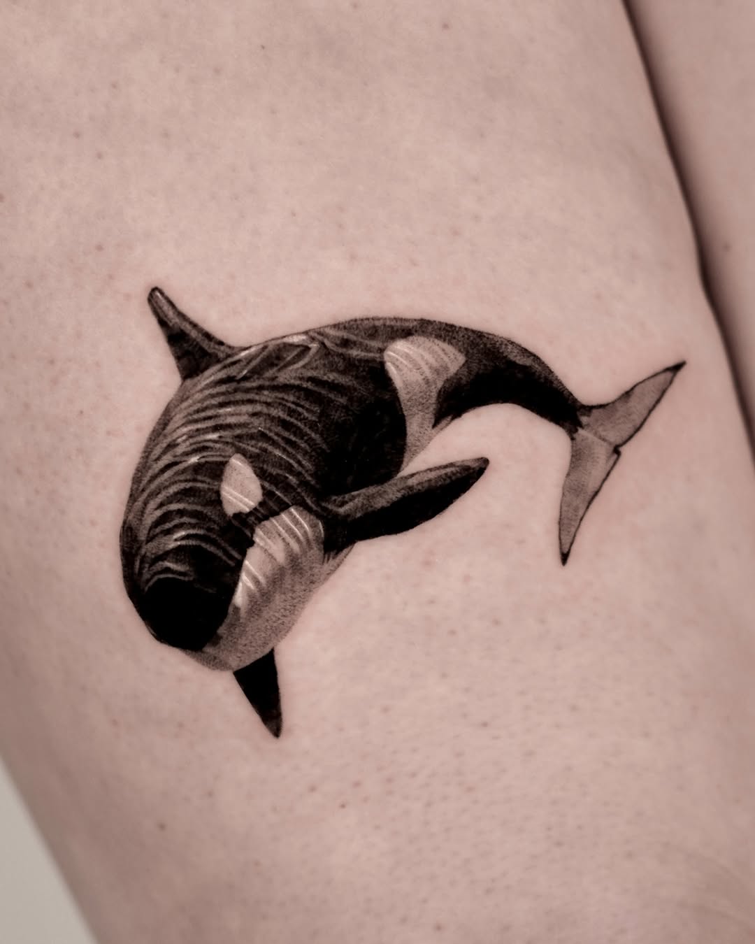 Stunning Minimalist Orca Tattoo for Arm