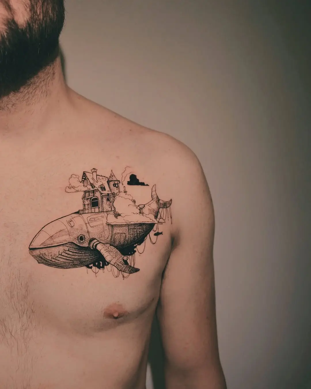 Steampunk-inspired whale tattoo with intricate details