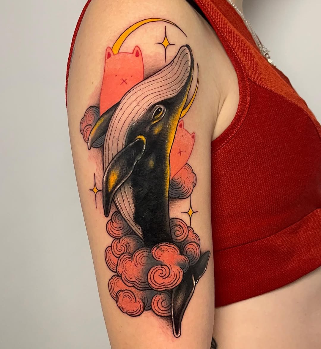 Colorful whale tattoo with whimsical elements