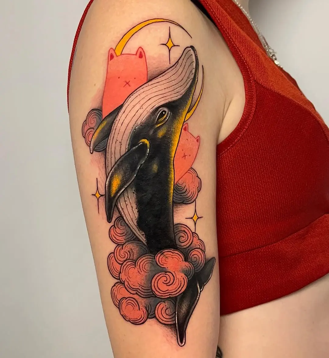 Colorful whale tattoo with whimsical elements