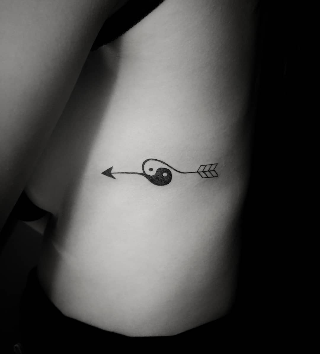 Yin Yang Arrow Tattoo: Balance and Direction