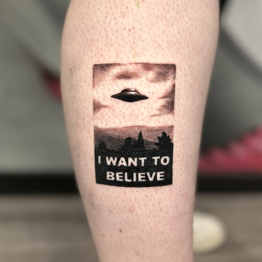 Iconic UFO tattoo with a nostalgic vibe