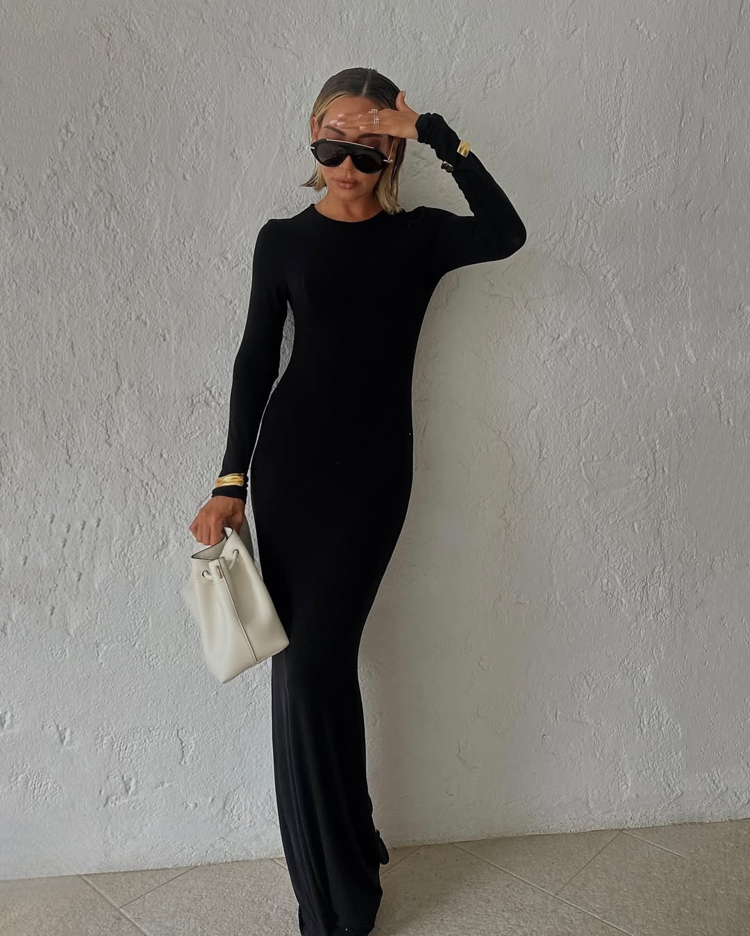 Chic and Sleek All-Black Maxi Dress Look