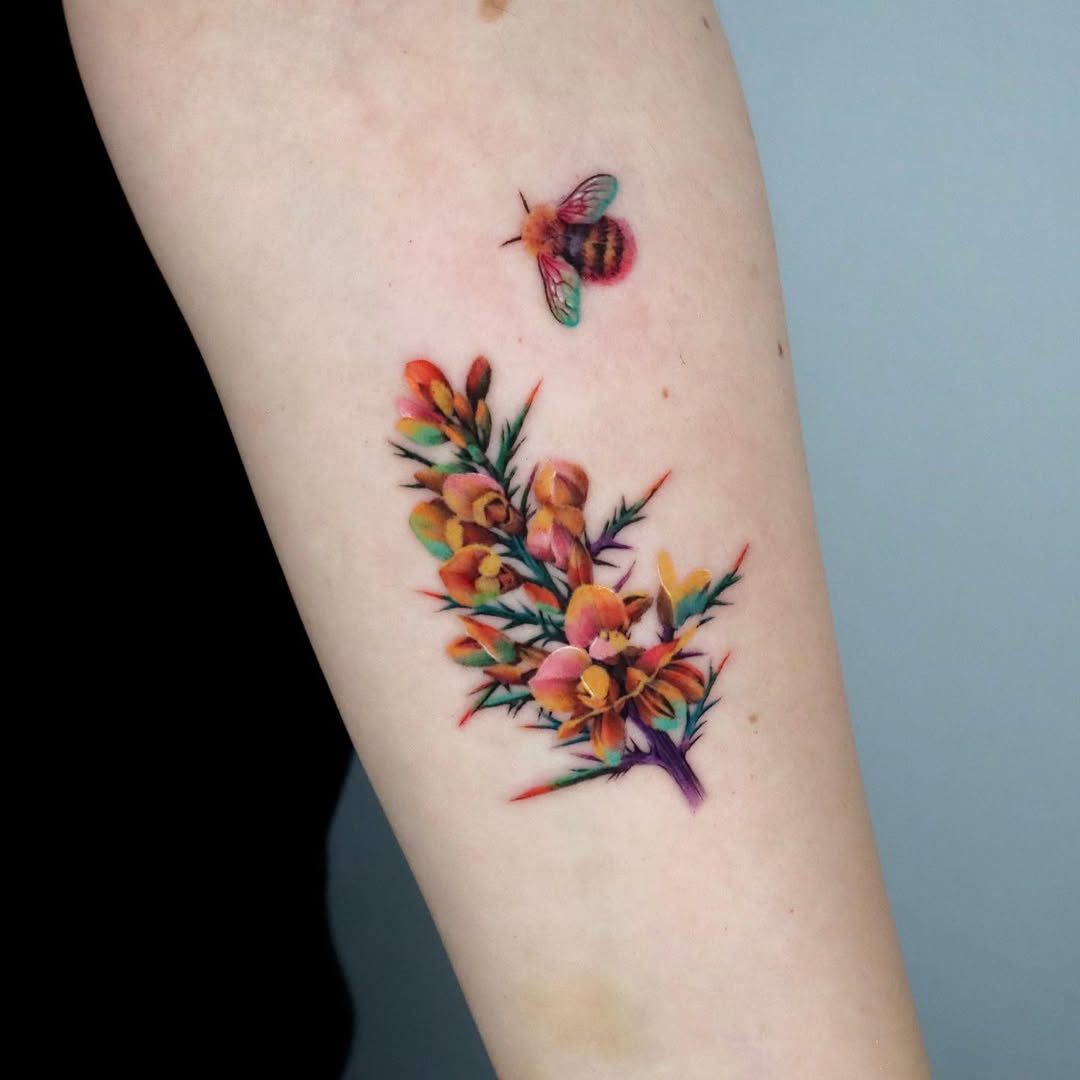 Stunning watercolor bee and floral tattoo design