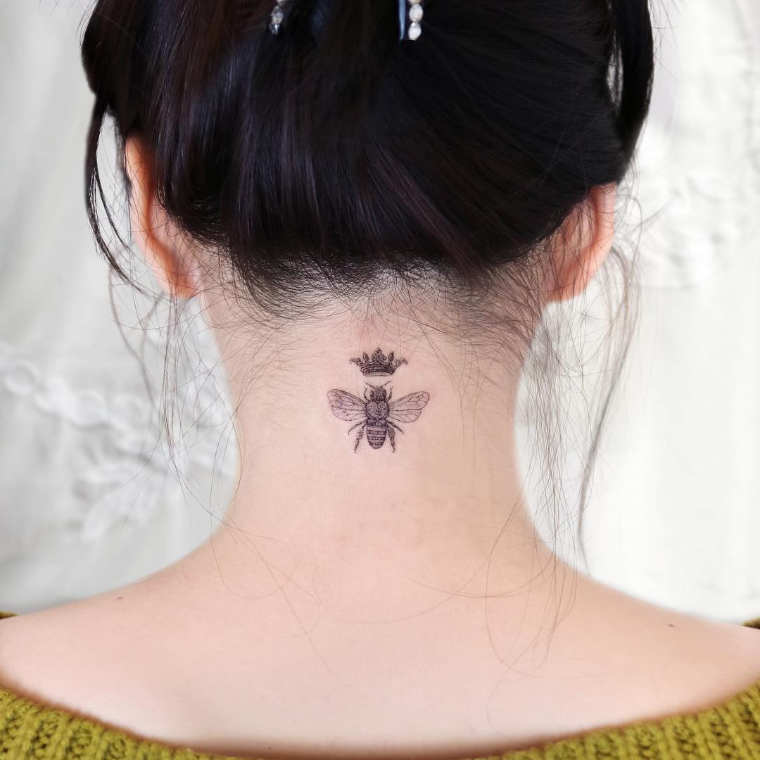 Charming queen bee tattoo design on nape