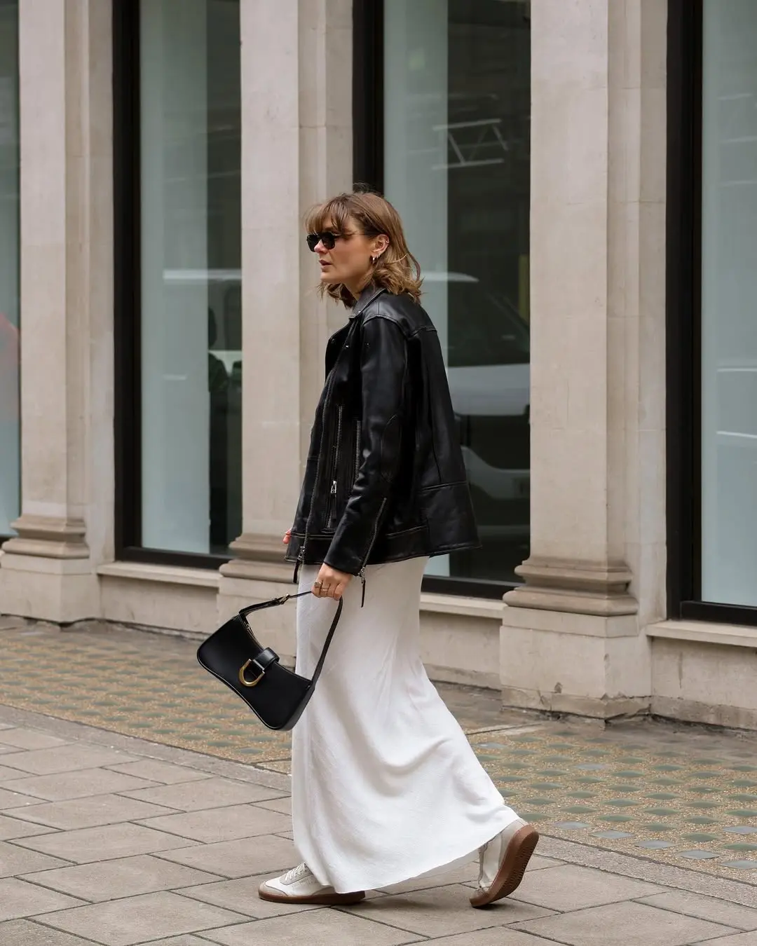 Edgy combination of leather and flowing dress