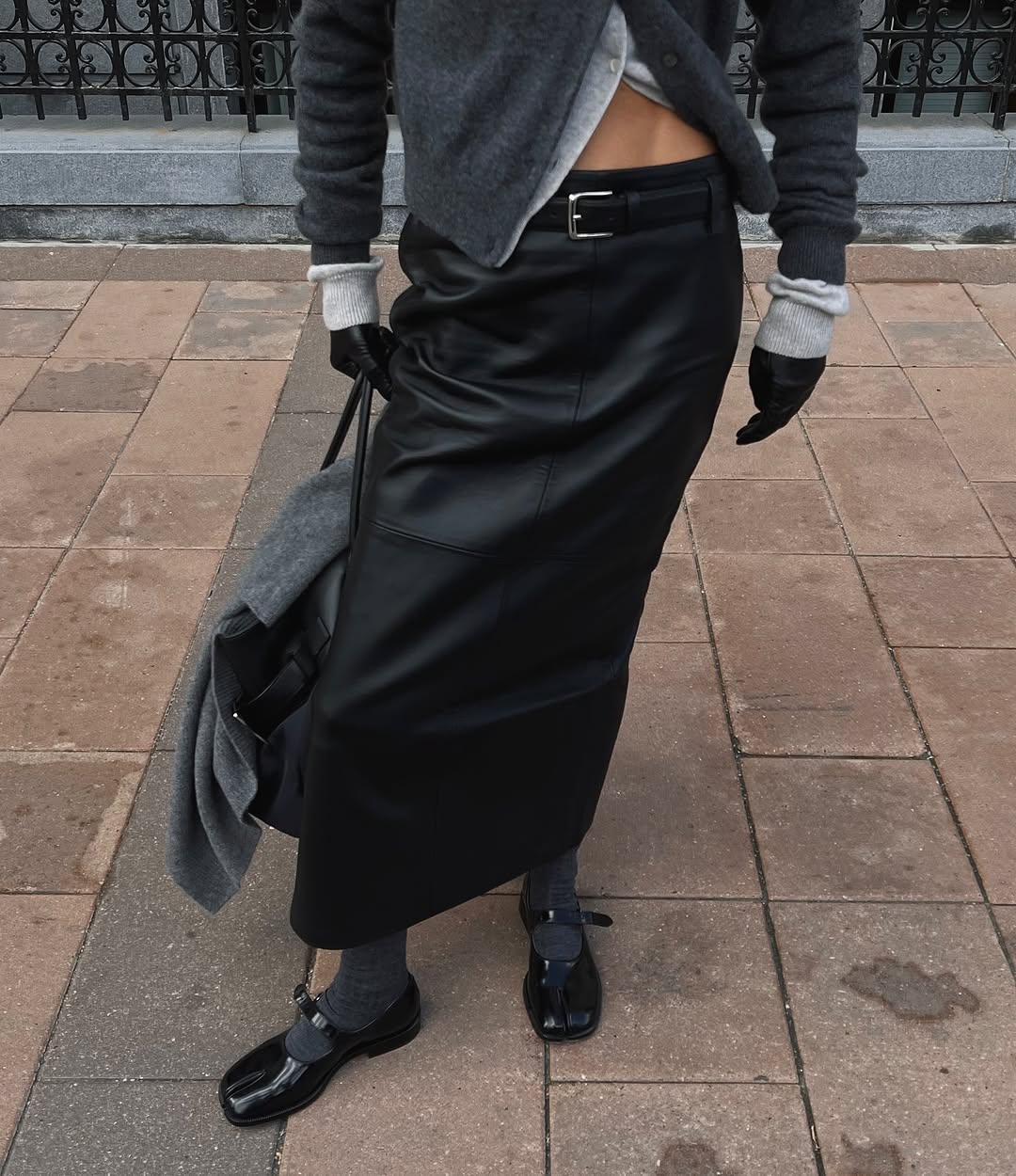 Chic streetwear look with a leather skirt