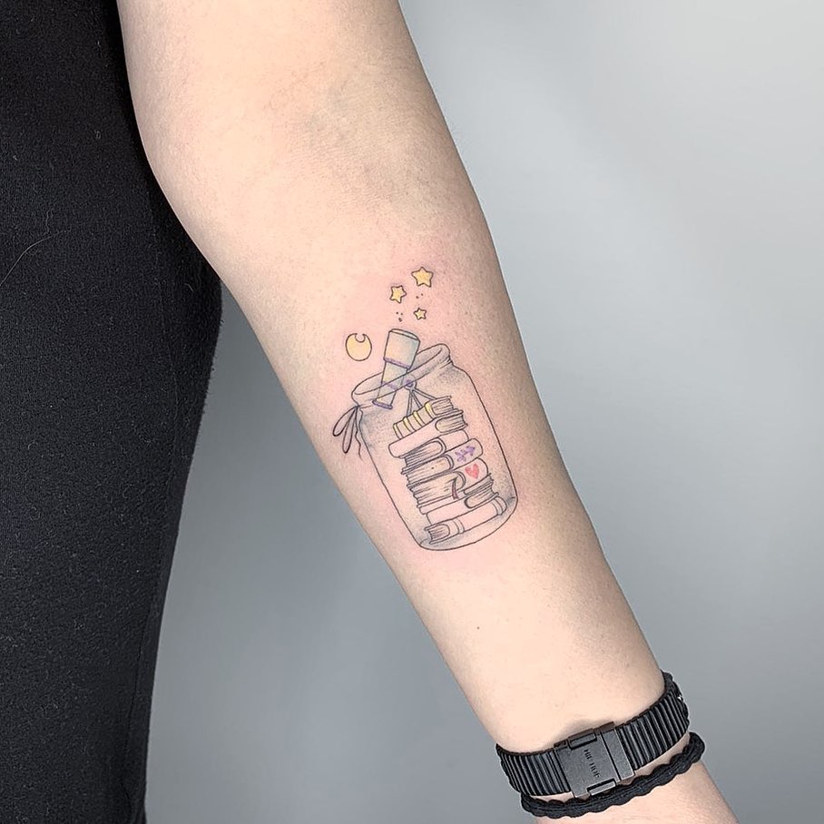 Cute bottle of books and stars tattoo