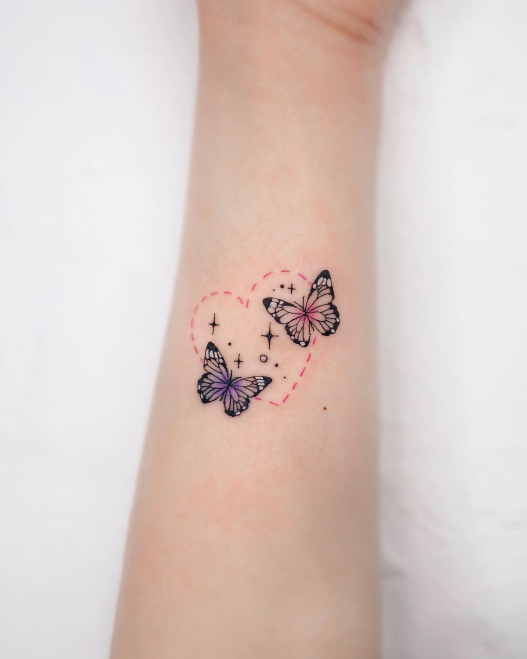 Whimsical butterfly heart with star details