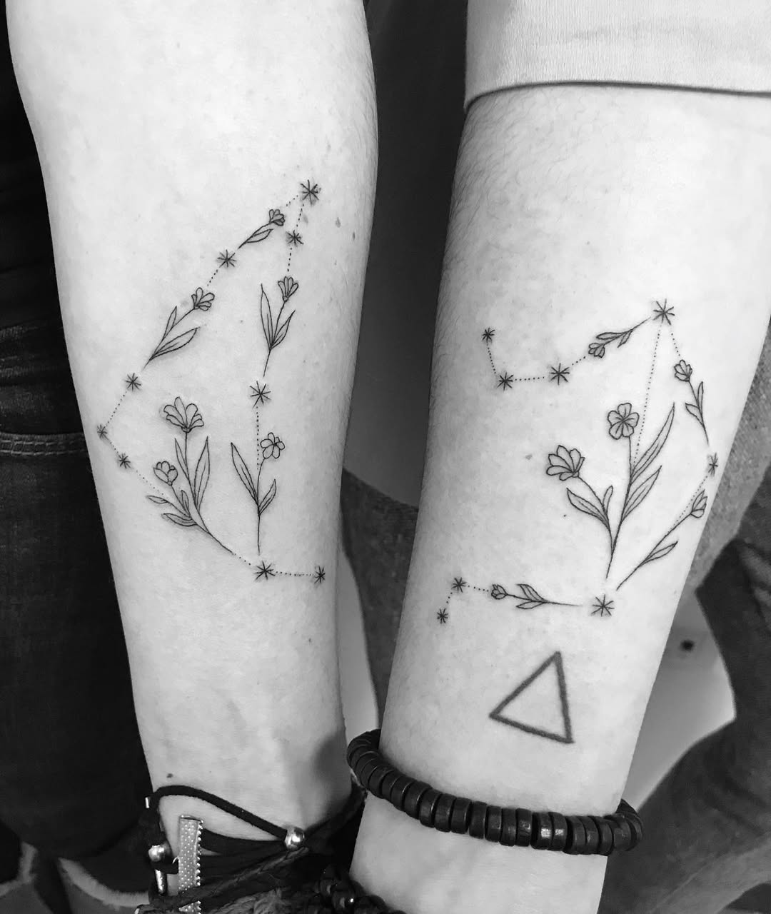 Elegantly crafted Capricorn constellation tattoos with florals