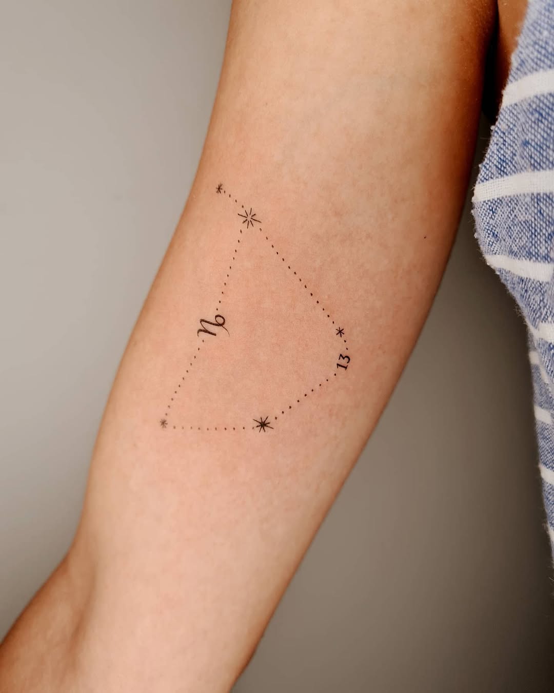 Simple, elegant Capricorn constellation tattoo concept