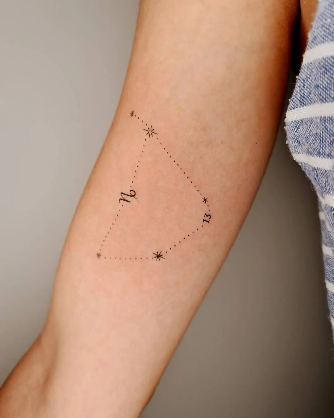 Simple, elegant Capricorn constellation tattoo concept
