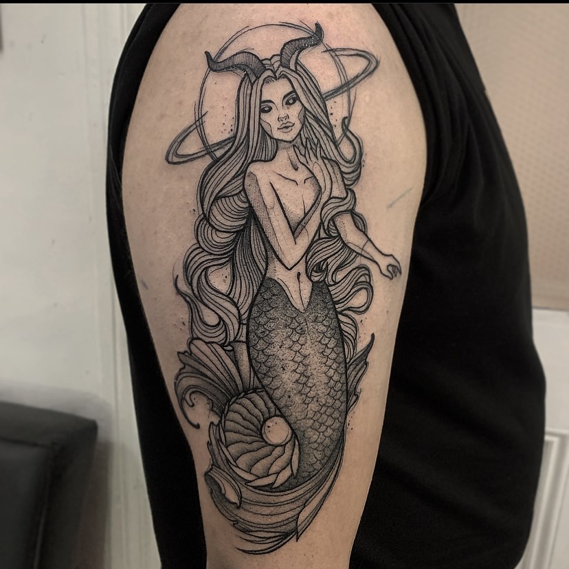 Elegant Capricorn Mermaid Tattoo with Cosmic Elements