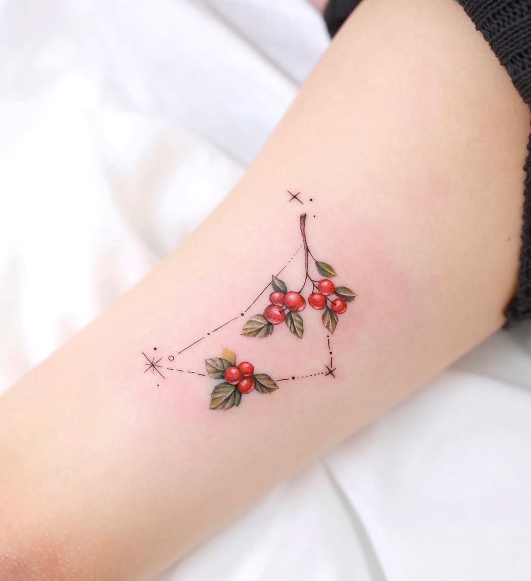 Charming Capricorn Tattoo with Cherry Blossoms