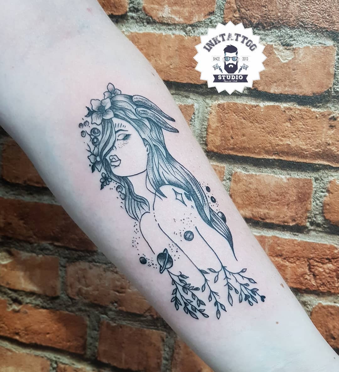 Celestial Capricorn Tattoo with Nature Elements