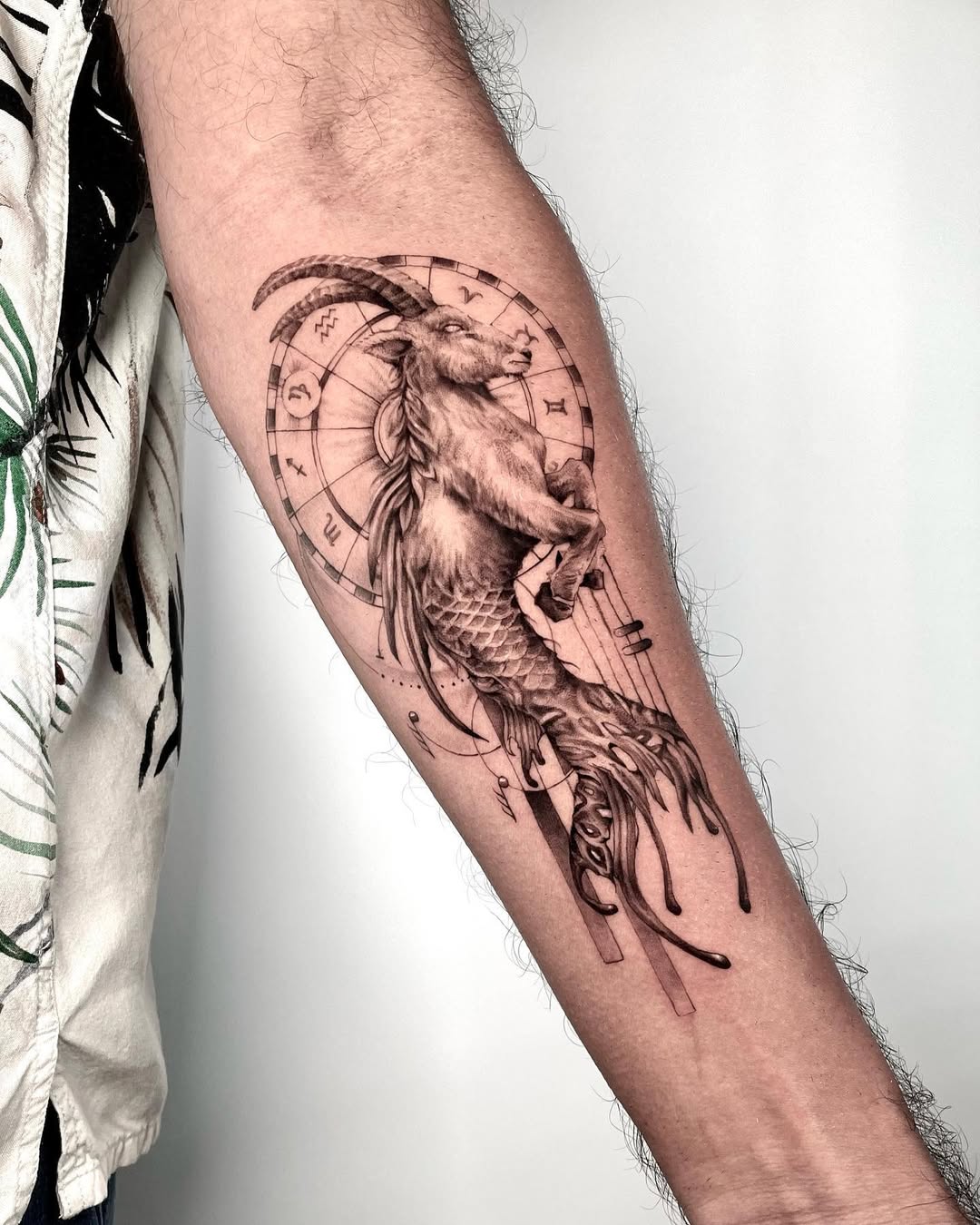 Intricate Capricorn Tattoo with Mermaid Elements