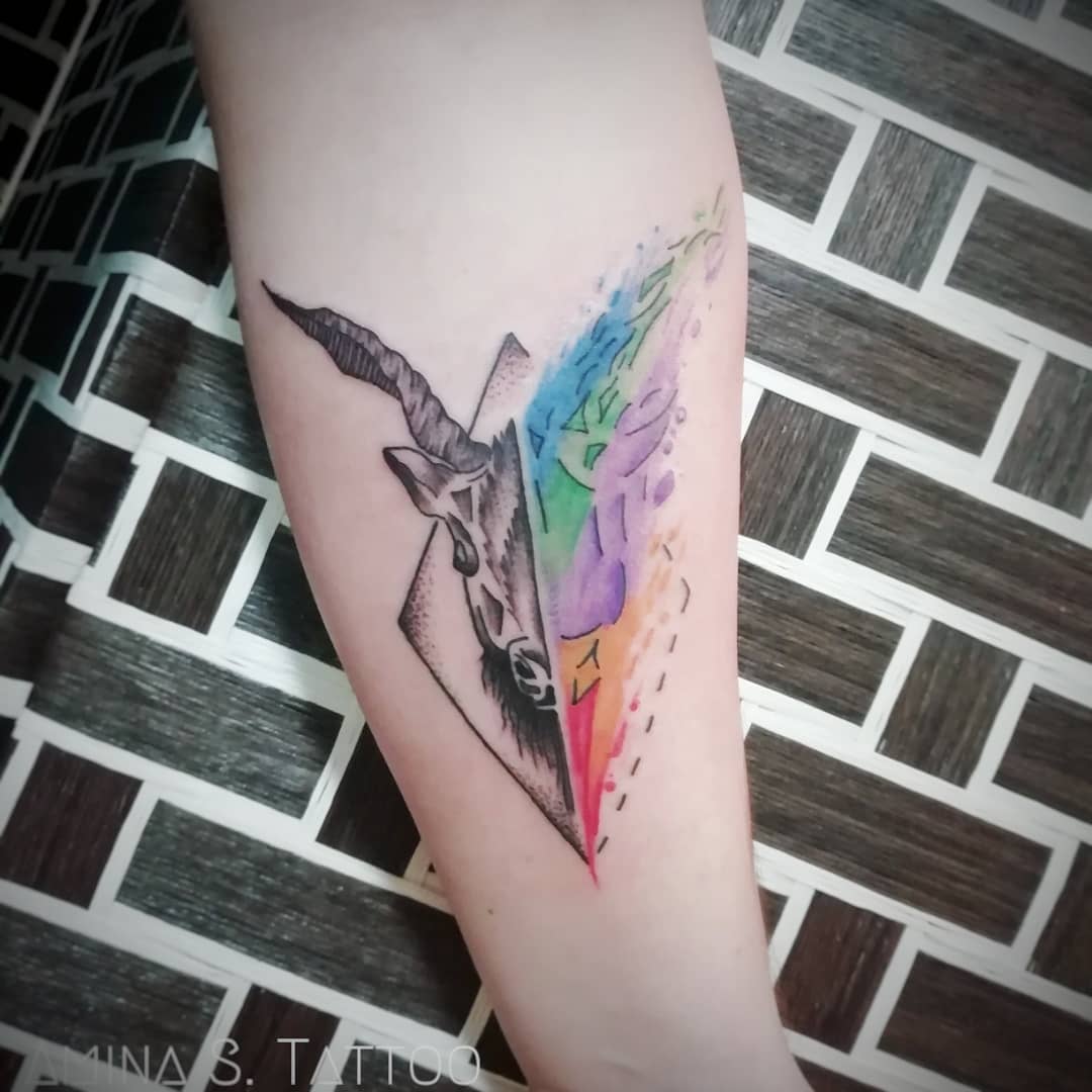 Vibrant Capricorn Tattoo with Colorful Elements