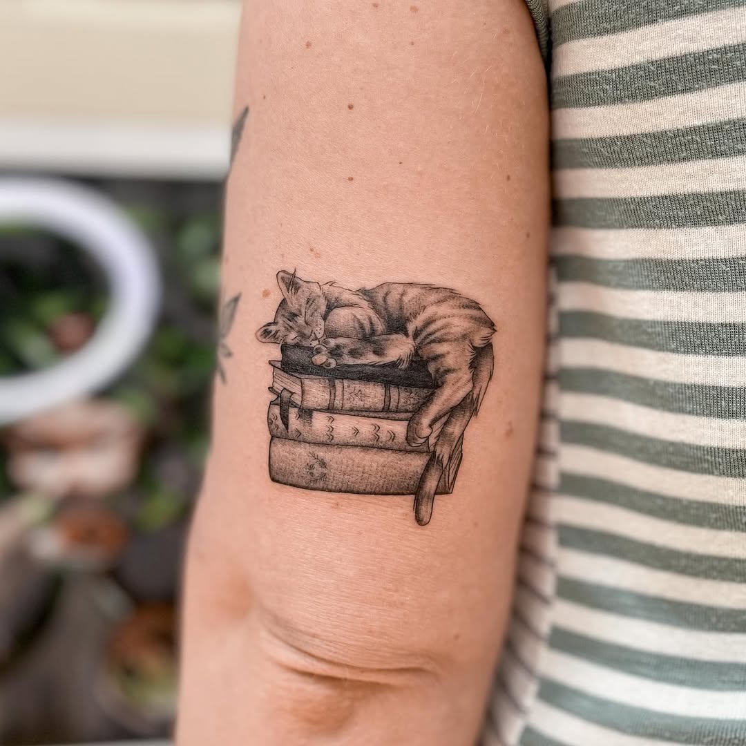 Charming Cat Nestled on Stacked Books