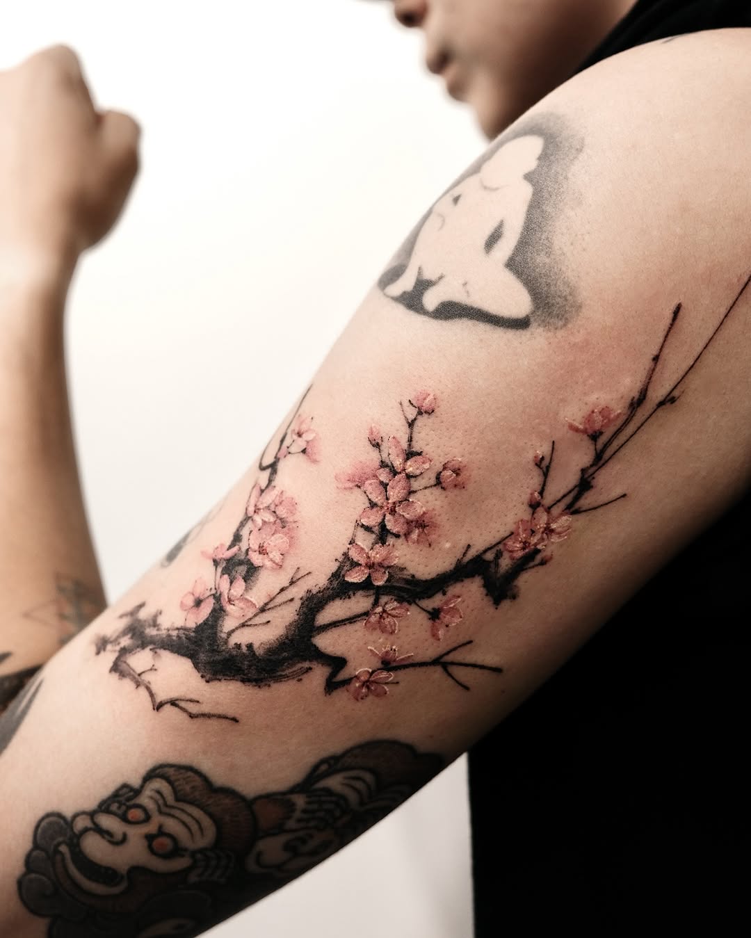 Stunning cherry blossom tattoo on the arm