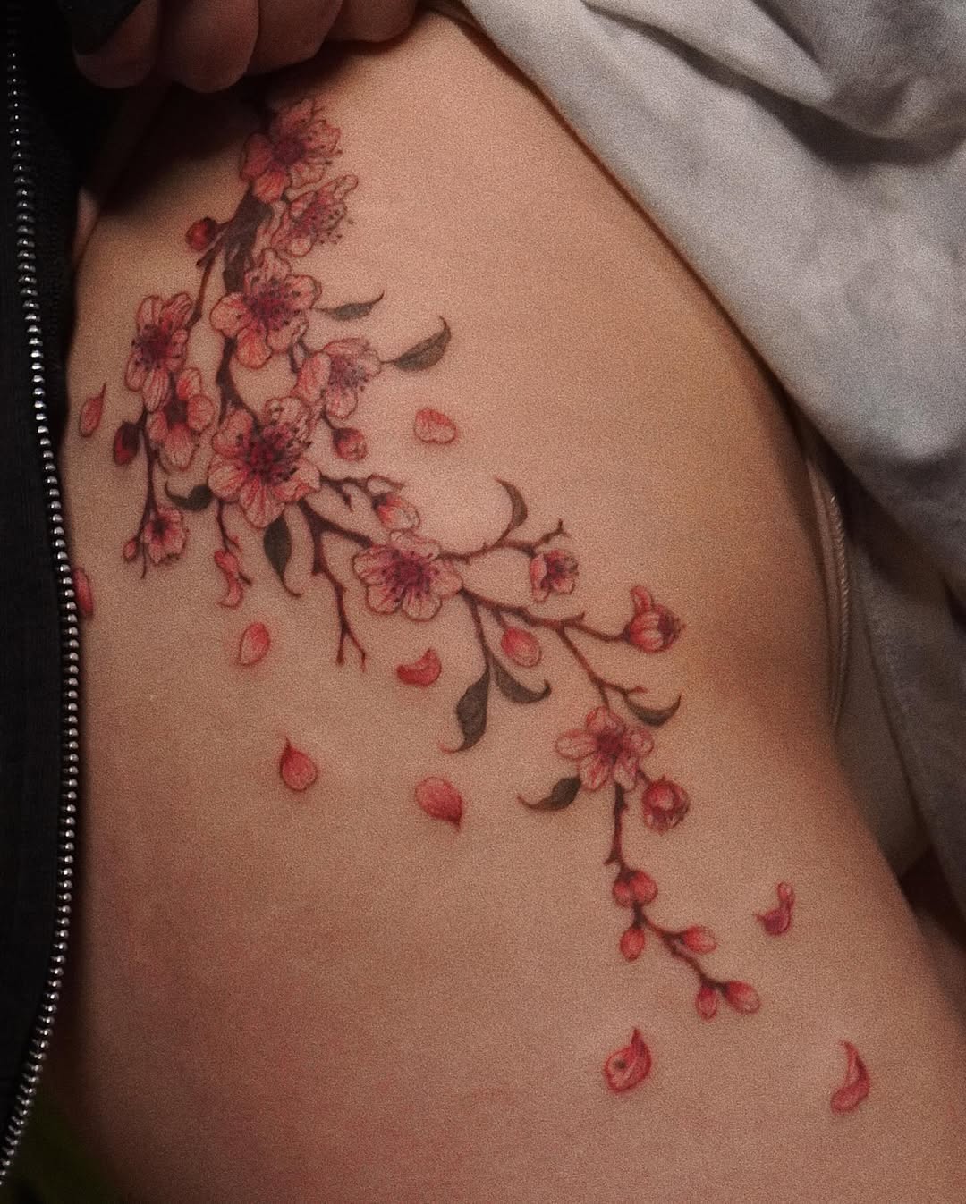 Elegant cherry blossoms cascading on the skin