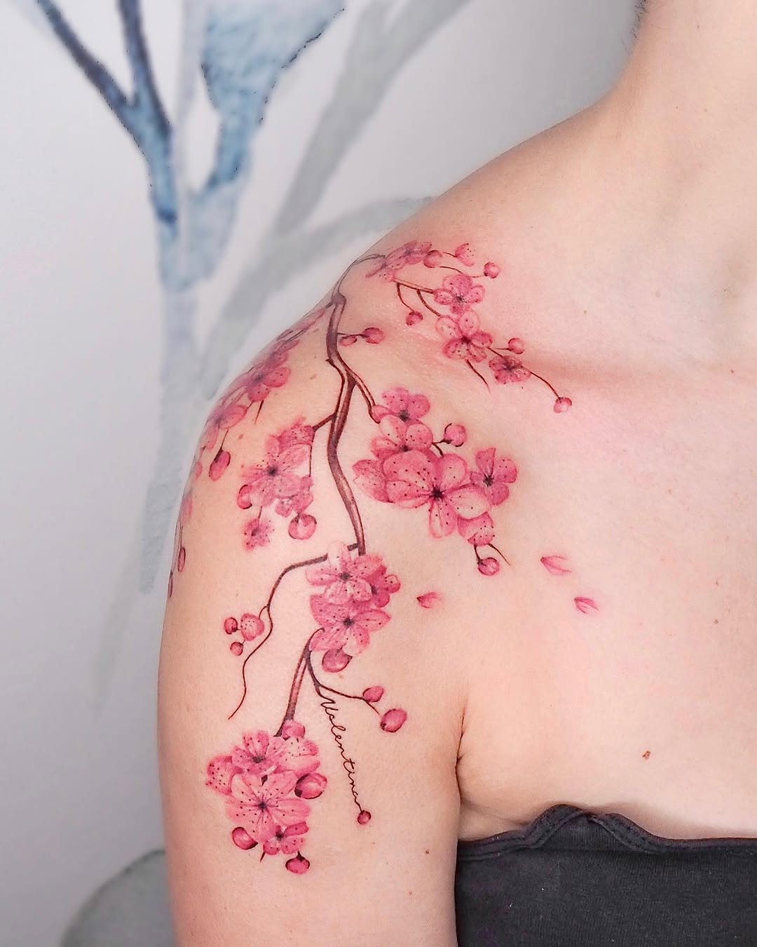 Stunning cherry blossom tattoo on shoulder