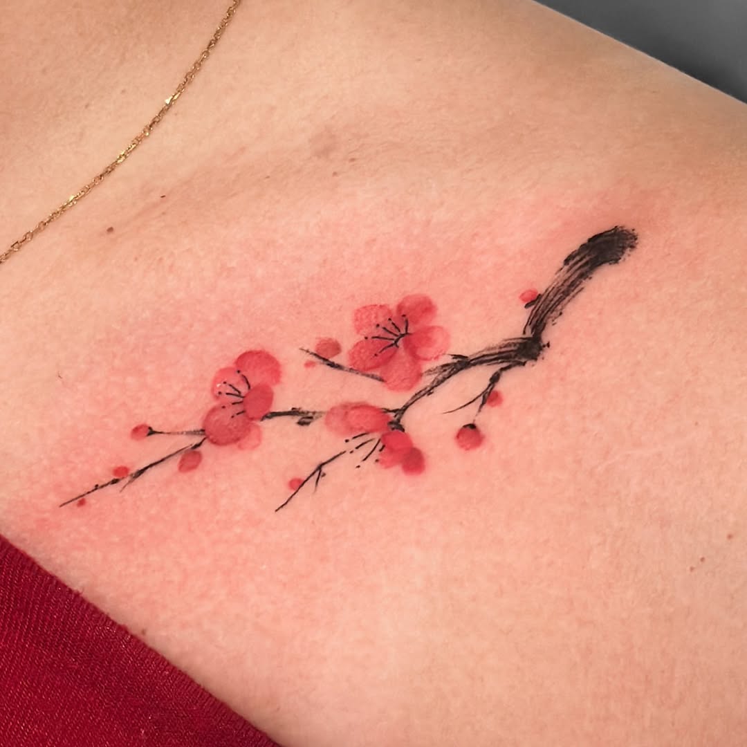 Delicate cherry blossoms on skin artistry