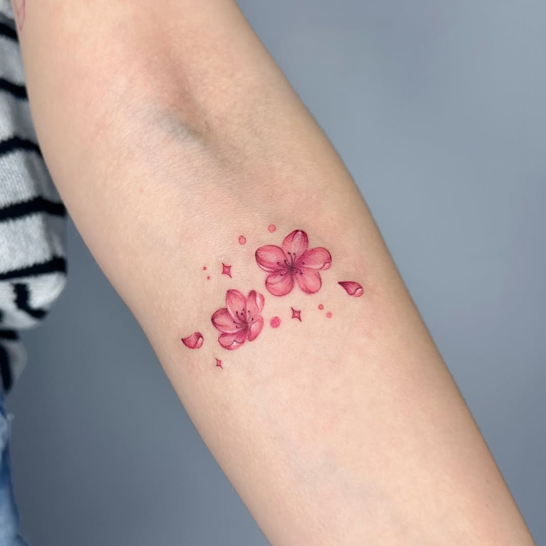 Elegant cherry blossom tattoo showcasing delicate beauty