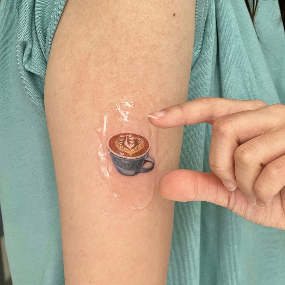 Minimalist latte art tattoo on skin