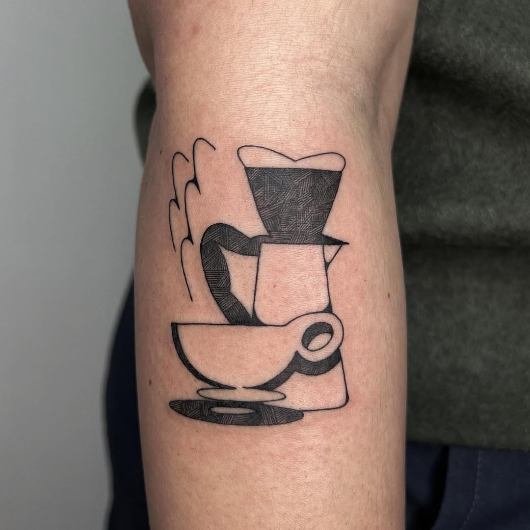 Stylish coffee cup tattoo with steam design