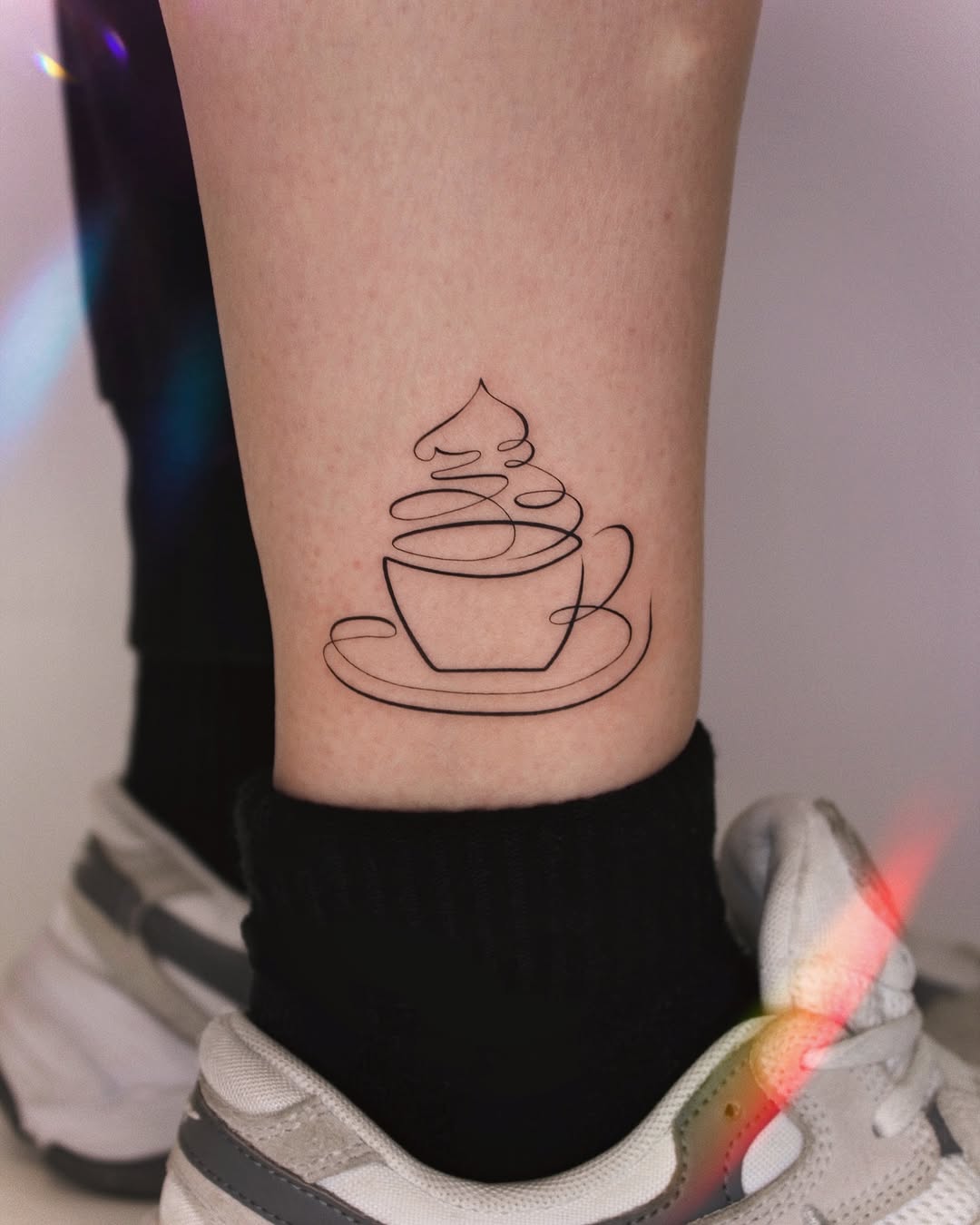 Chic Minimalist Coffee Cup Tattoo Design