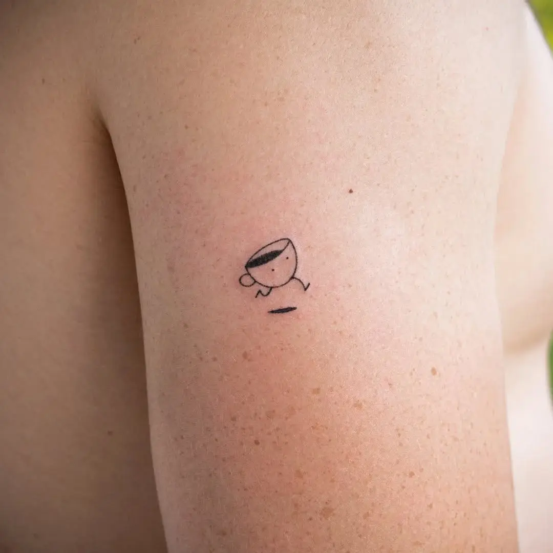 Charming minimalist coffee cup tattoo design