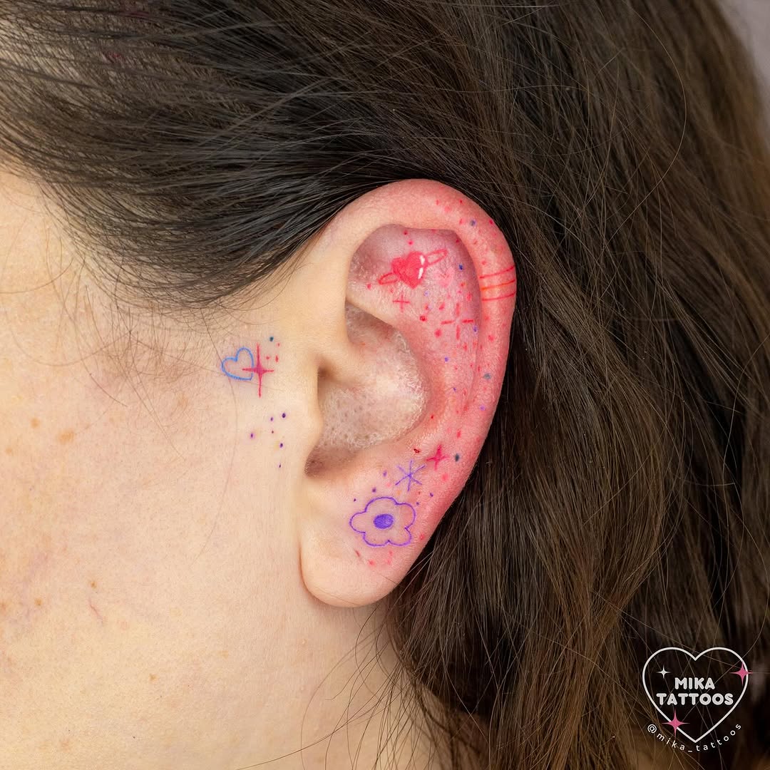 Playful ear tattoo designs in vibrant colors