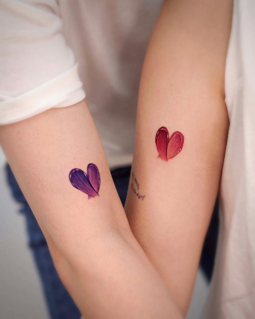 Charming hearts: a vibrant tattoo statement