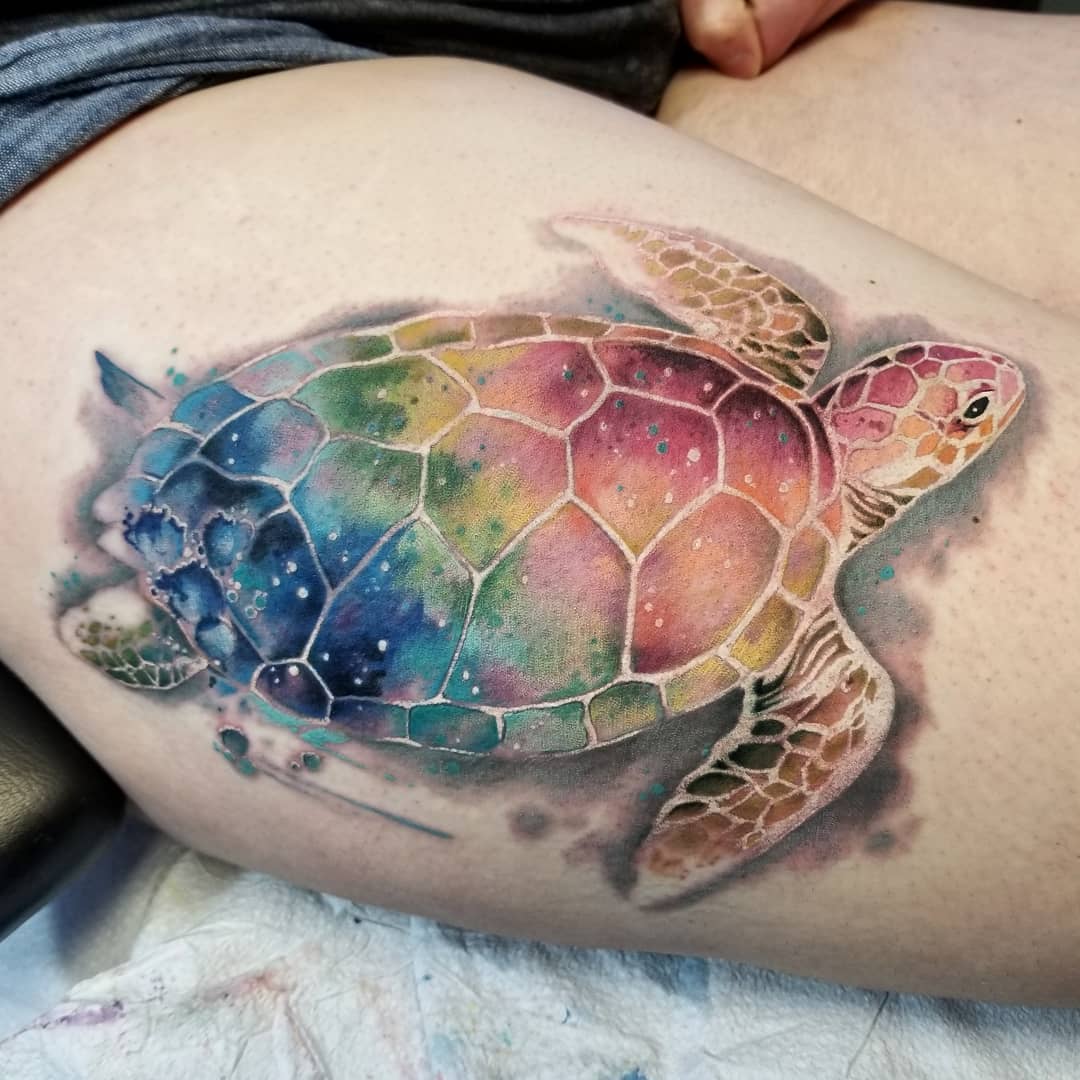 Vibrant watercolor sea turtle tattoo design