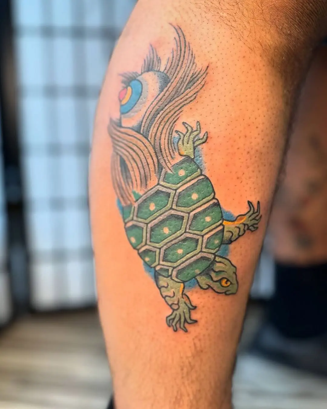 Vibrant turtle tattoo showcasing striking sea elements